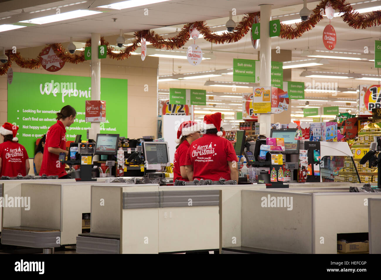coles supermarket store in sydneyaustralia staff are wearing merry christmas clothes and hats - Coles Christmas Decorations coles supermarket store in sydneyaustralia staff are wearing merry christmas clothes and hats - Coles Christmas Decorations