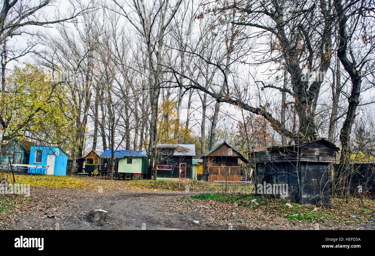 Small houses for accommodation of fishermen and fishing tackle and relaxing near the river. Stock Photo