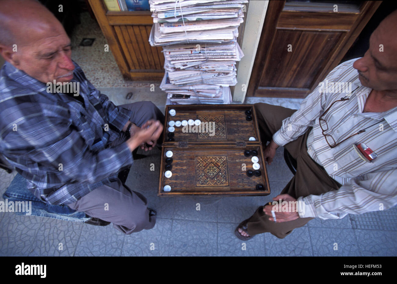 Couple of men playing backgammon in Al-Hamidiyah Souq, Damascus, Syria Stock Photo