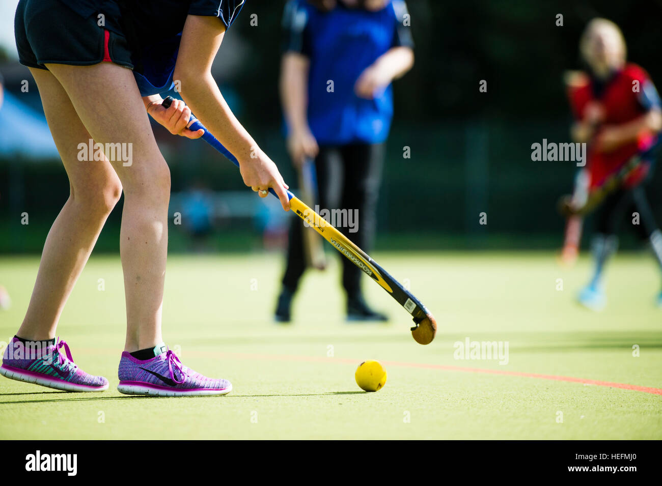 Girl playing field hockey hires stock photography and images Alamy