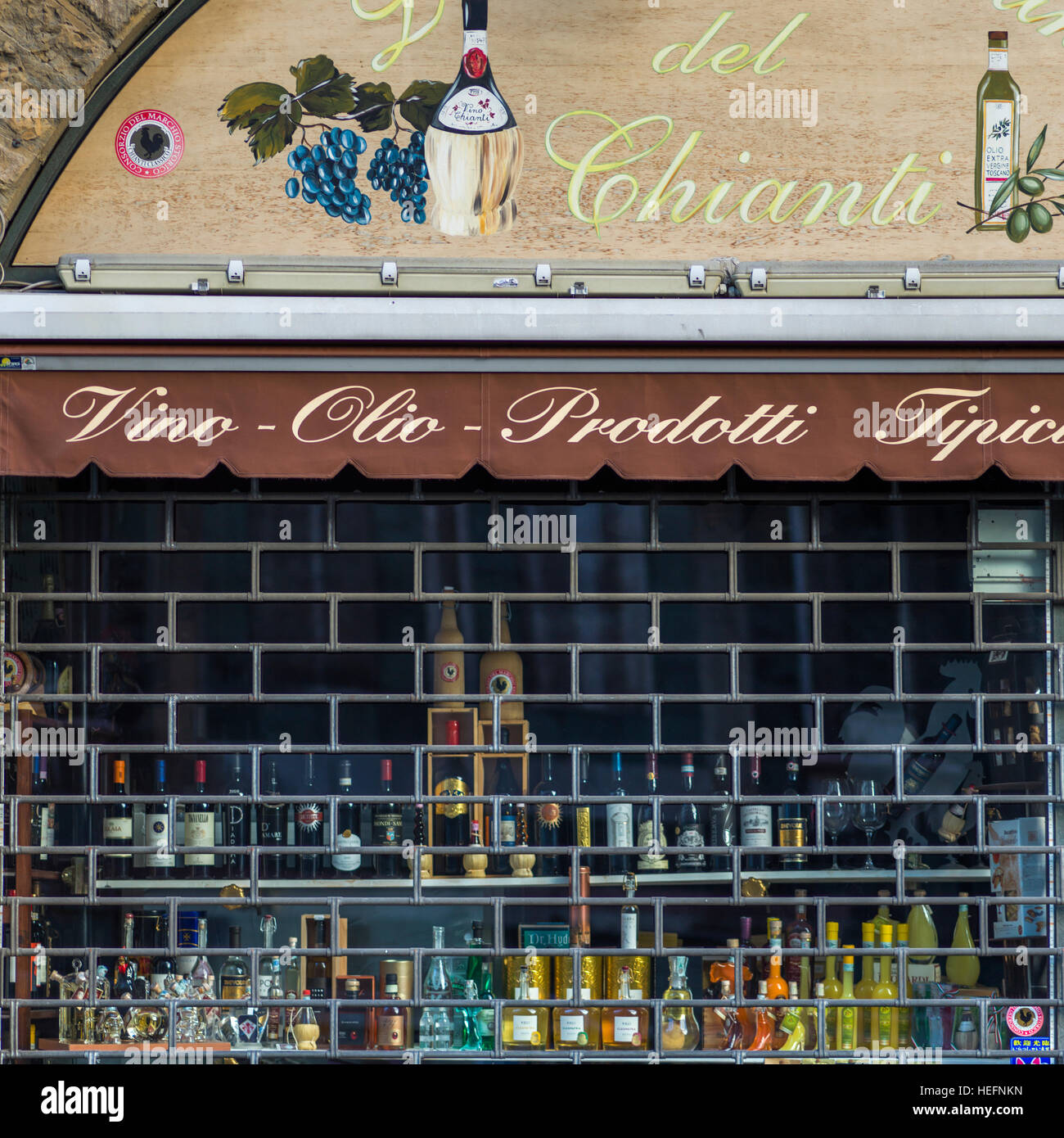 Wine bottles on display in wine shop, Florence, Tuscany, Italy Stock