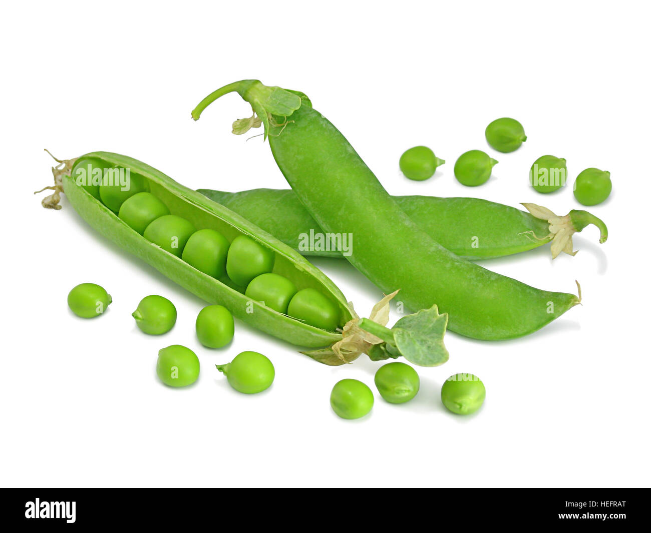 Sweet peas. Fresh pea pods isolated on white background. One pea pod is open. Stock Photo