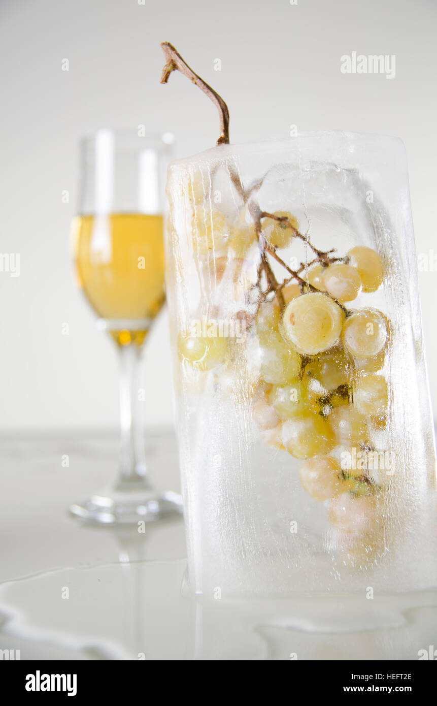 Wine and frozen grapes Stock Photo Alamy