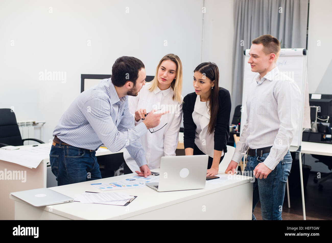 Group Young Coworkers Making Great Business Decisions.Creative Team Discussion Corporate Work Concept Modern Office.Startup Marketing Idea Presentation. Stock Photo