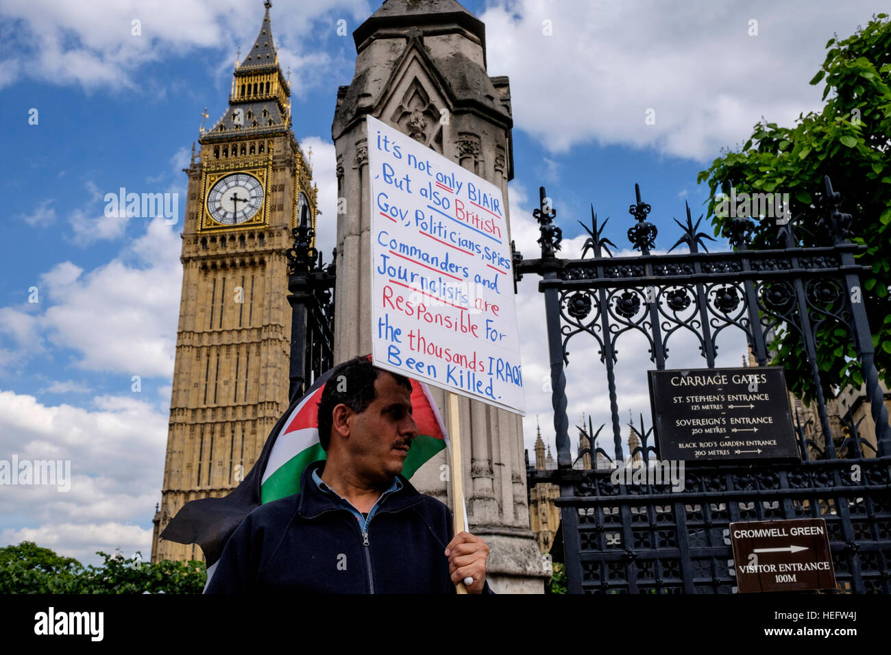 Anti-war protester outside the Houses of Parliament in Westminster, London Stock Photo