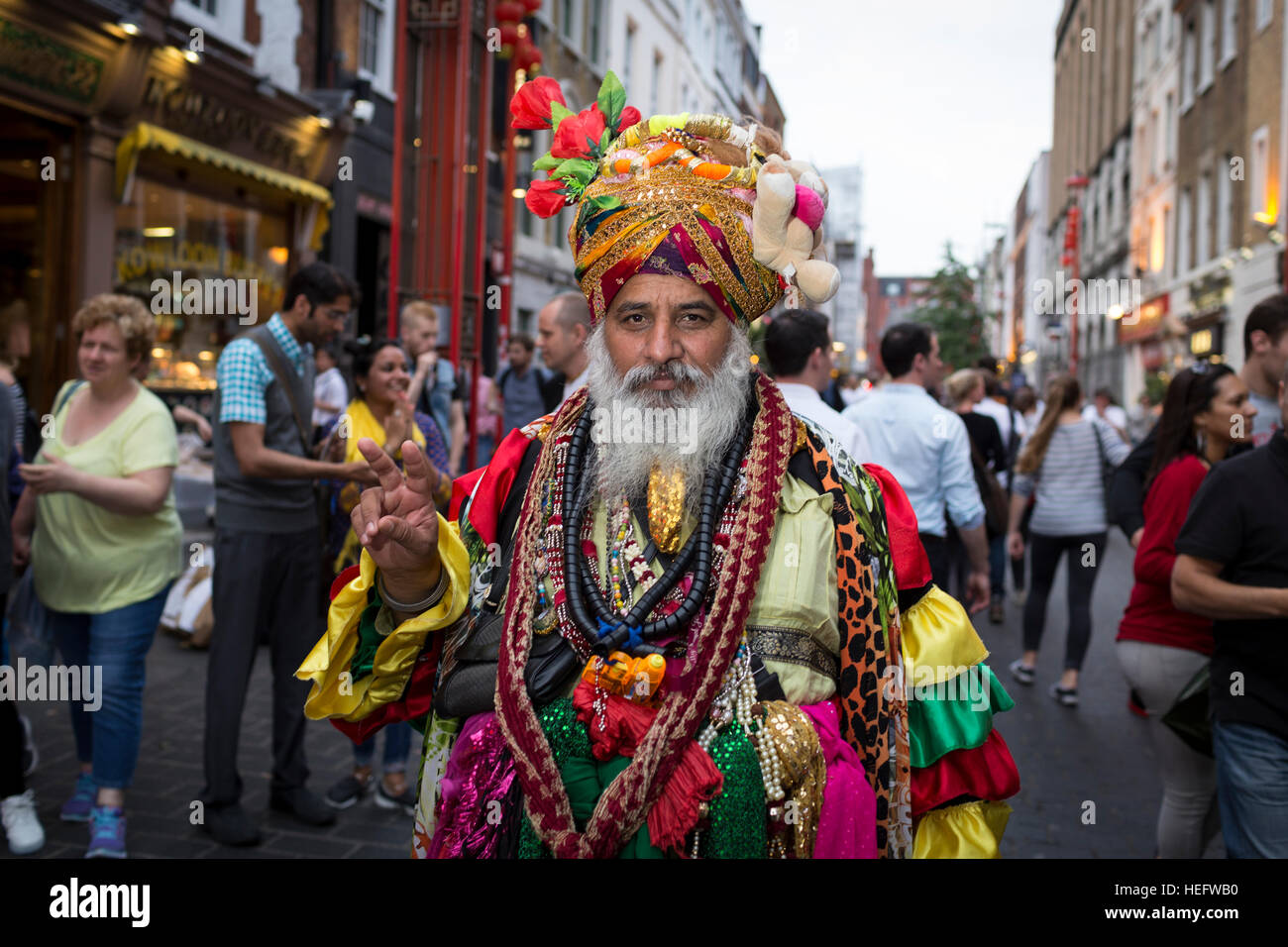 Every Saturday evening in London's Chinatown Hare Krishna devotee's meet and celebrate with the public Stock Photo
