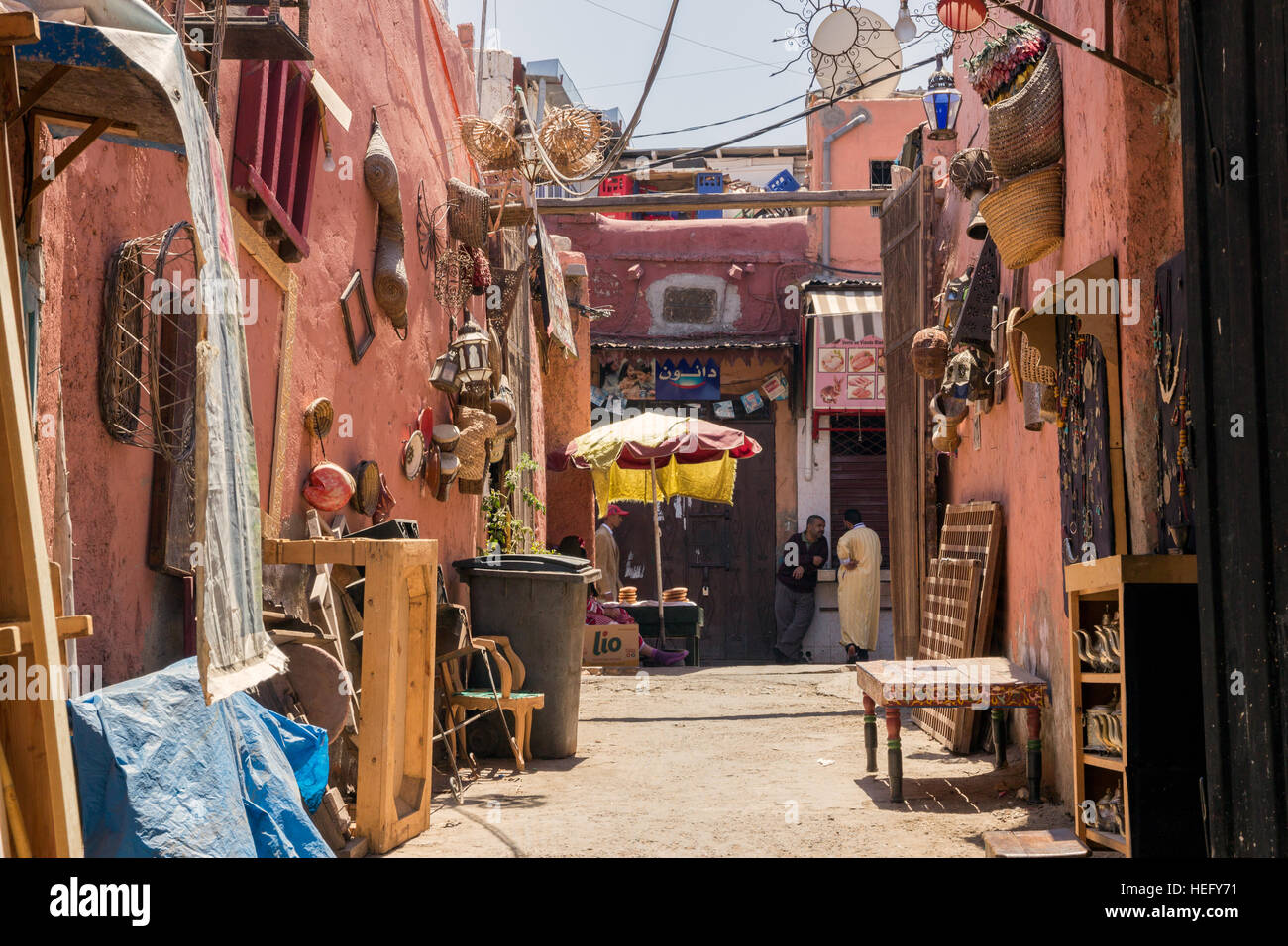 Street with sellers in the souks of Marrakesh, Morocco Stock Photo