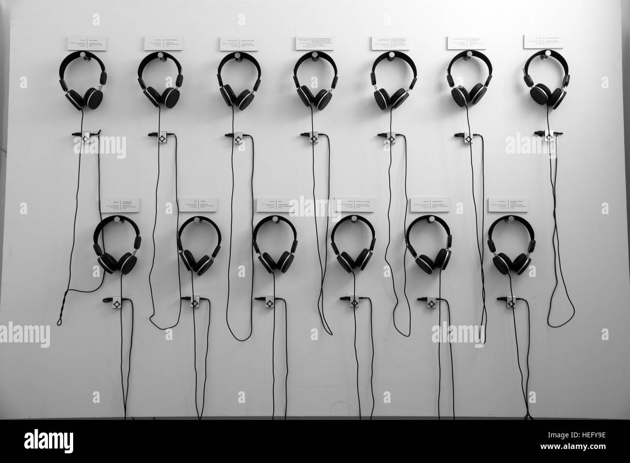Headphones on a wall Stock Photo