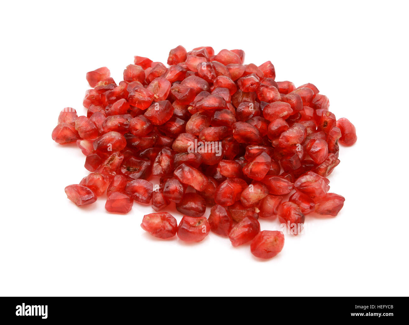 Fresh pomegranate seeds, isolated on a white background Stock Photo