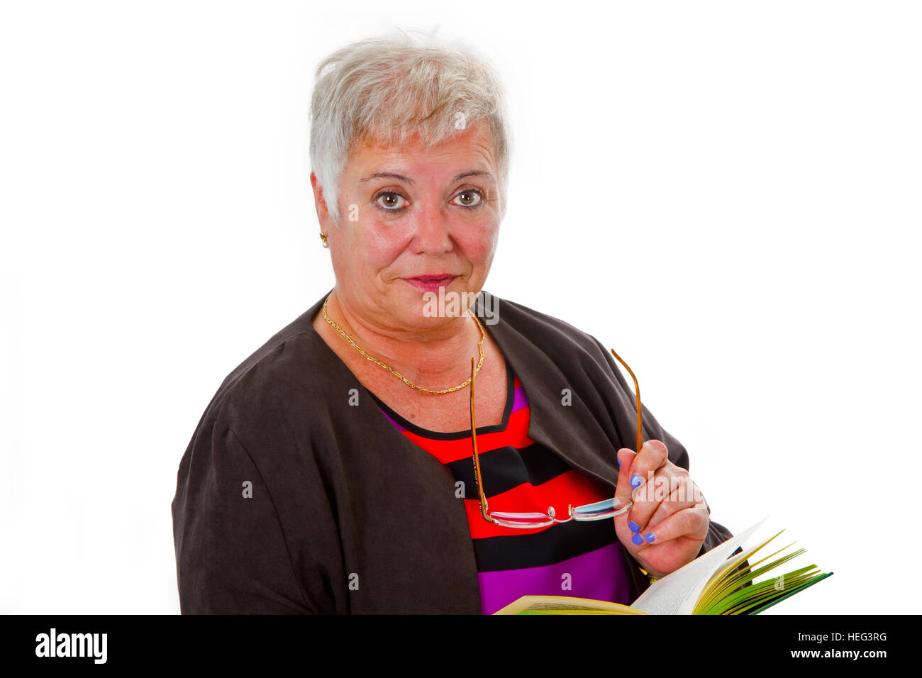 Female senior reading a book - isolated on white background Stock Photo ...