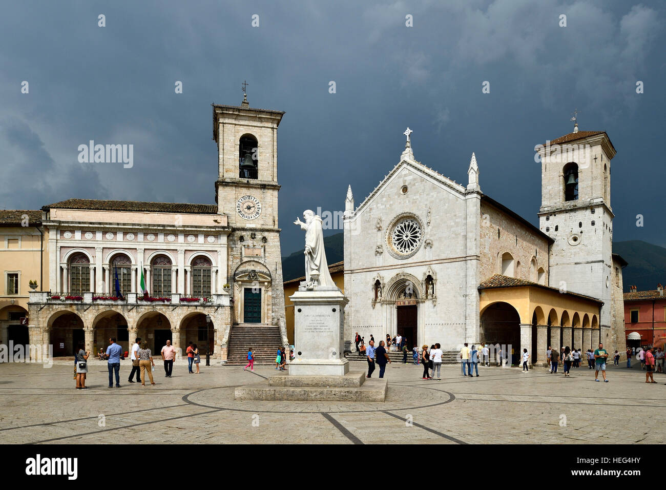 Palazzo Comunale Town Hall and Basilica di San Benedetto, stormy sky, Norica, Perugia, Umbria, Italy Stock Photo
