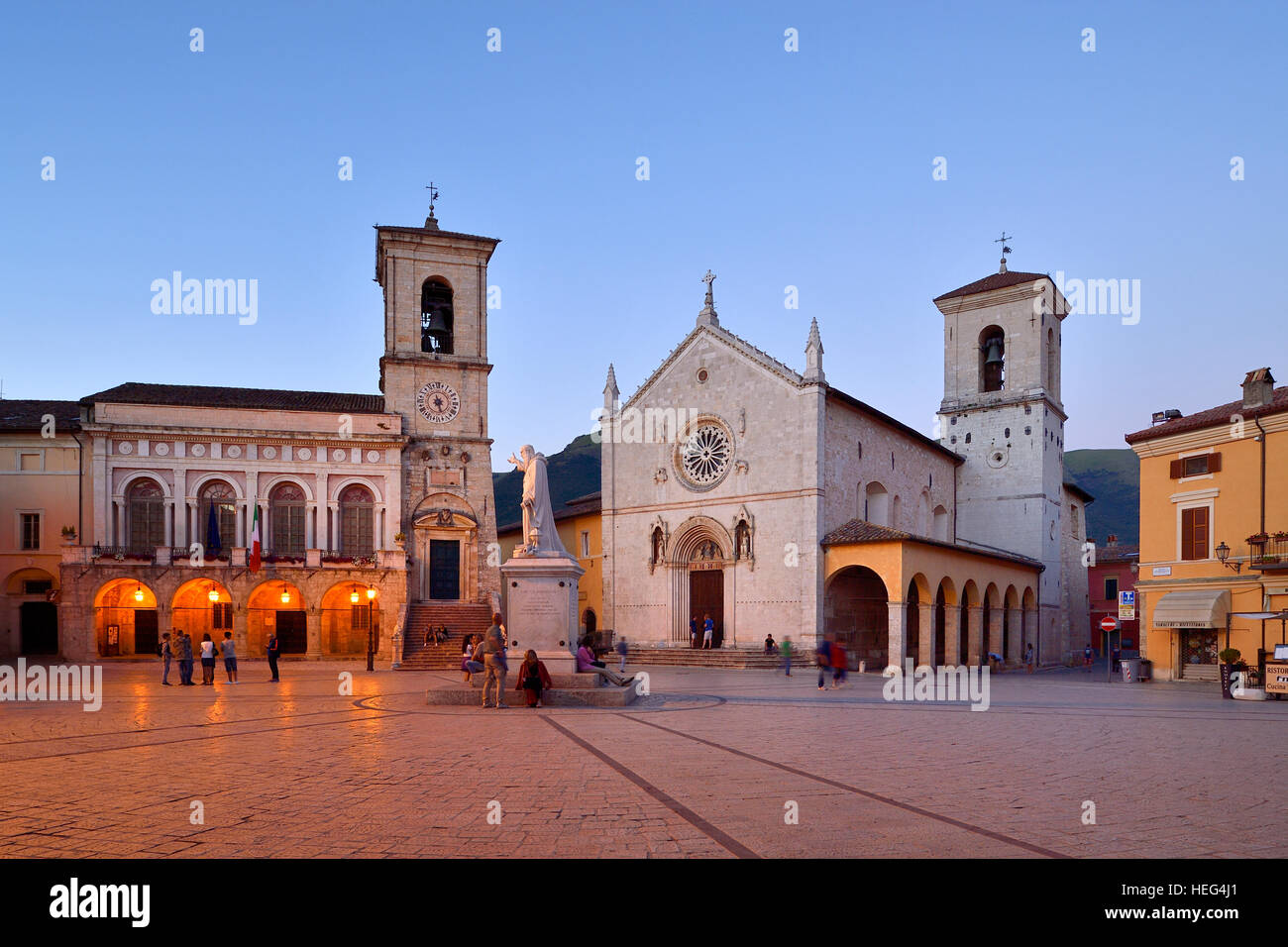 Palazzo Comunale Town Hall and Basilica di San Benedetto at twilight, Norica, Perugia, Umbria, Italy Stock Photo