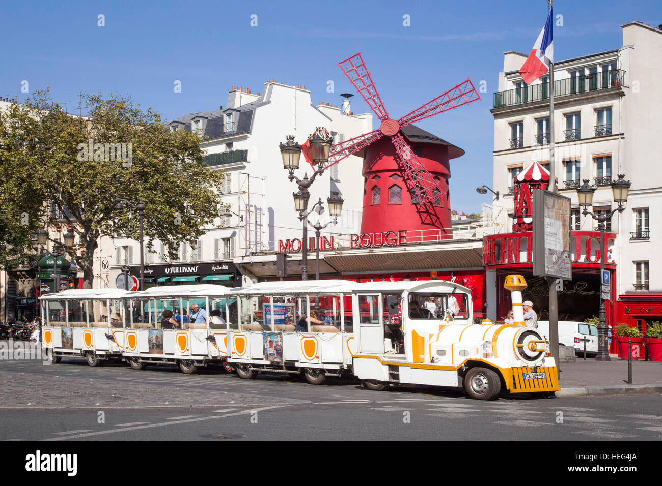 Tourist train in front of Varieté Theater Moulin Rouge, Montmartre, Paris Stock Photo