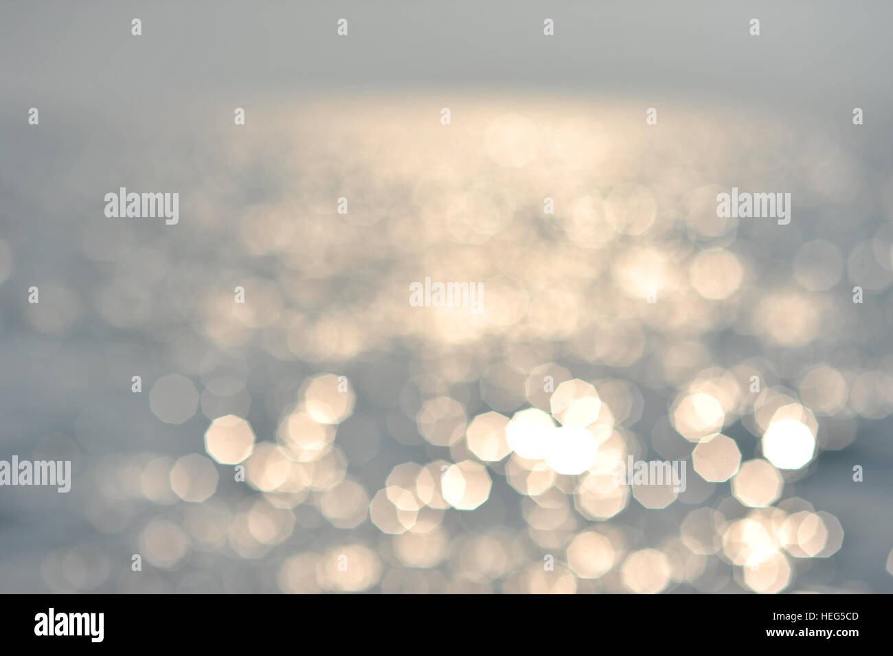 the bokeh from reflection of sun on sea surface Stock Photo - Alamy