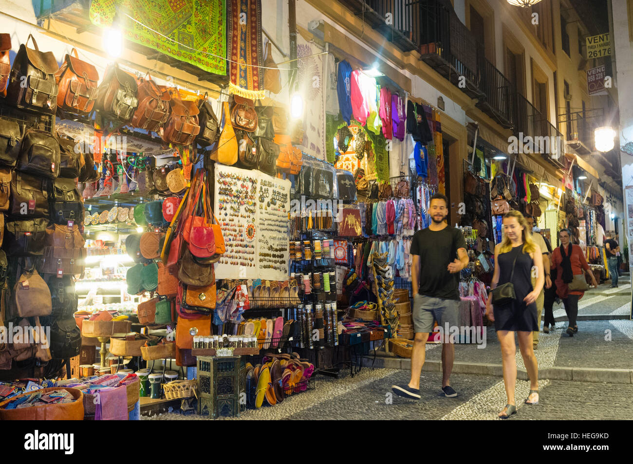 Tourists and moorish souvenir shops at Caldereria st. at the Unesco