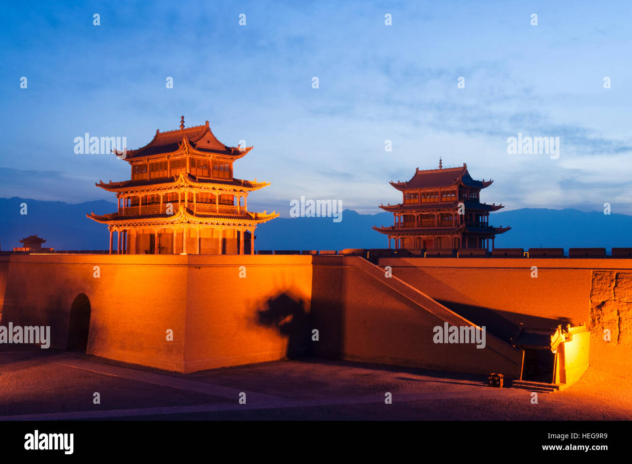 Jiayuguan fort illuminated at twilight at the western boundary of the