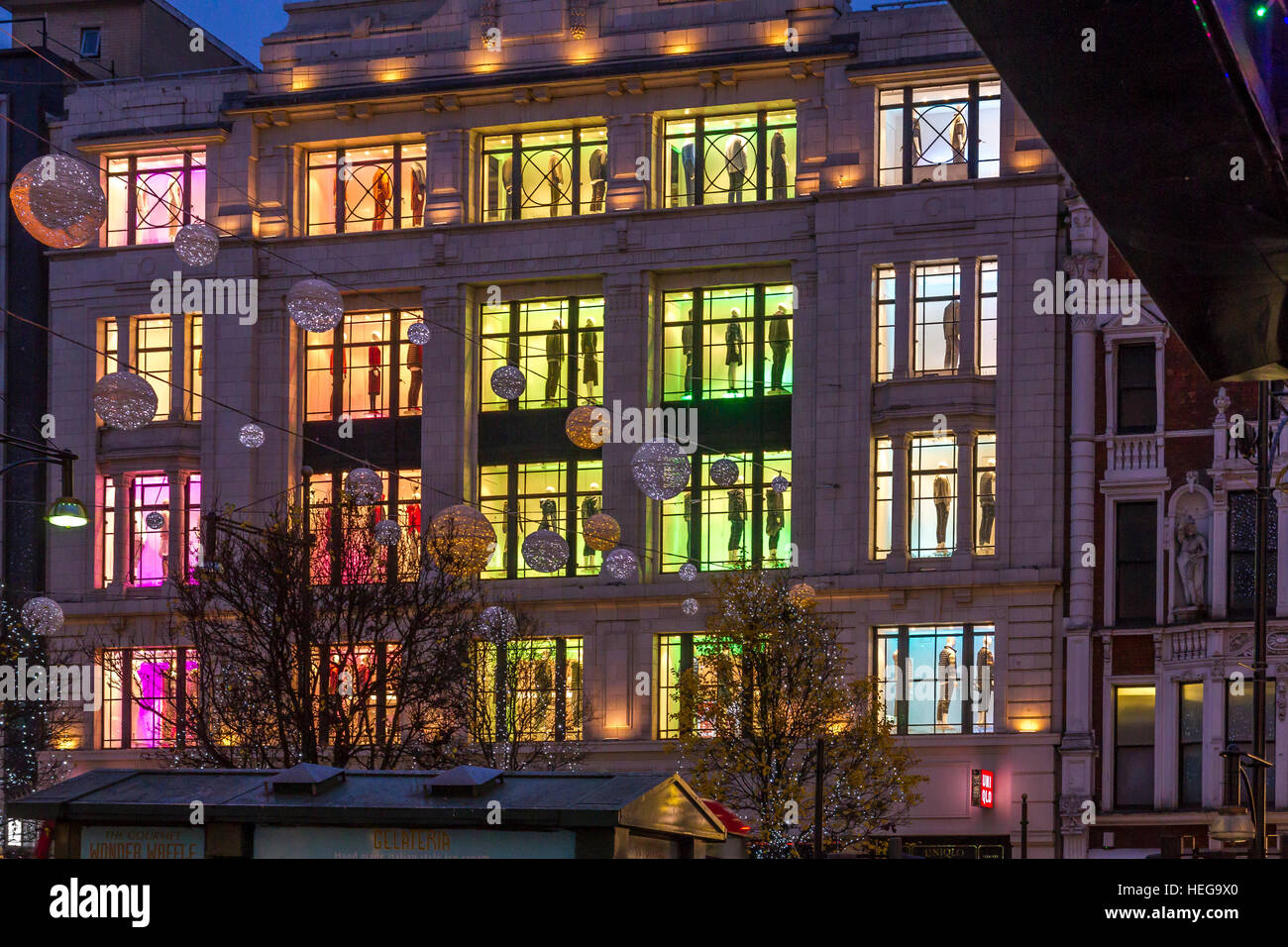The glow of Illuminated window's at the Uniqlo store on Oxford St in  London,UK Stock Photo - Alamy