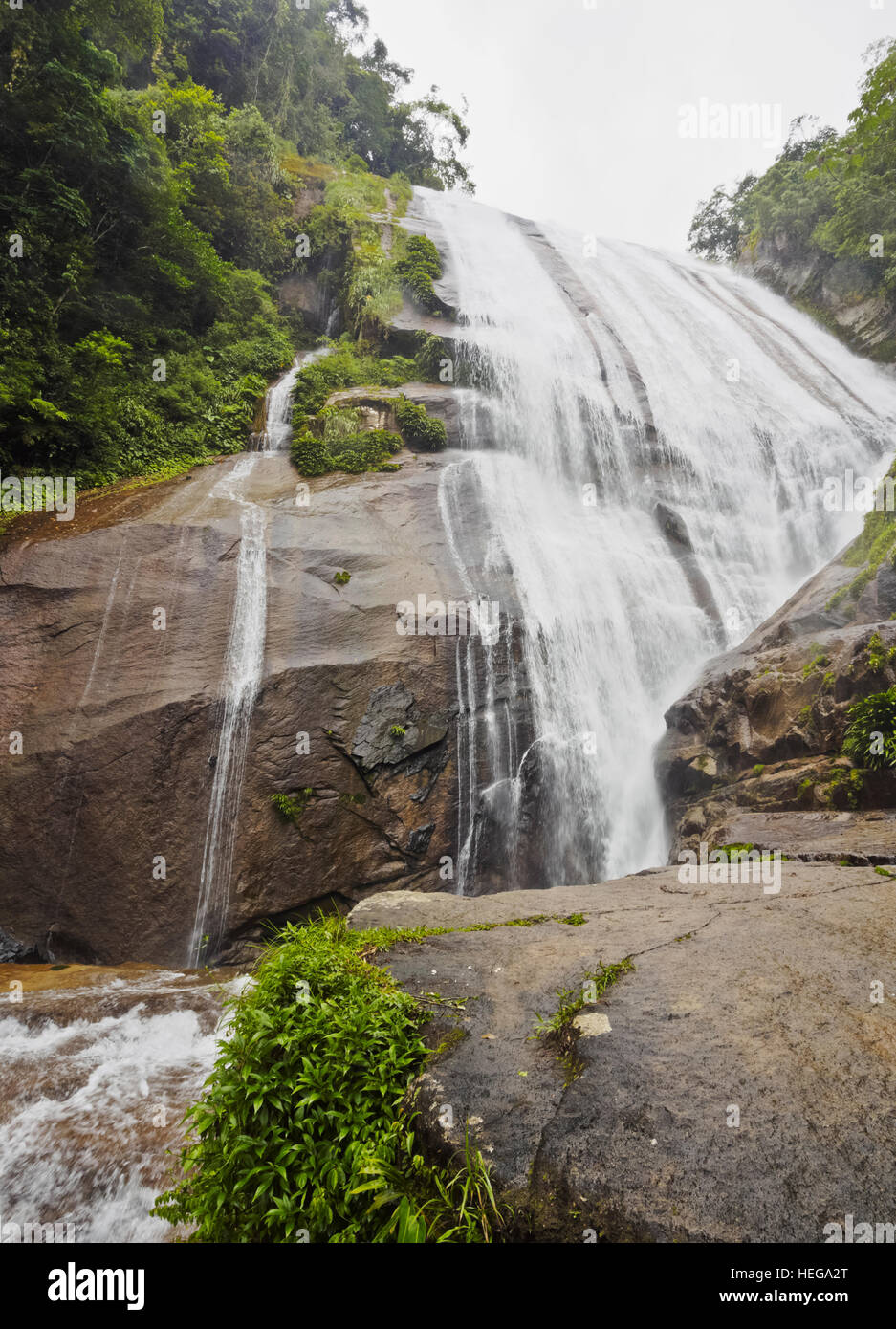 Brazil, State of Sao Paulo, Ilhabela Island, View of the Cachoeira do Gato Waterfall. Stock Photo