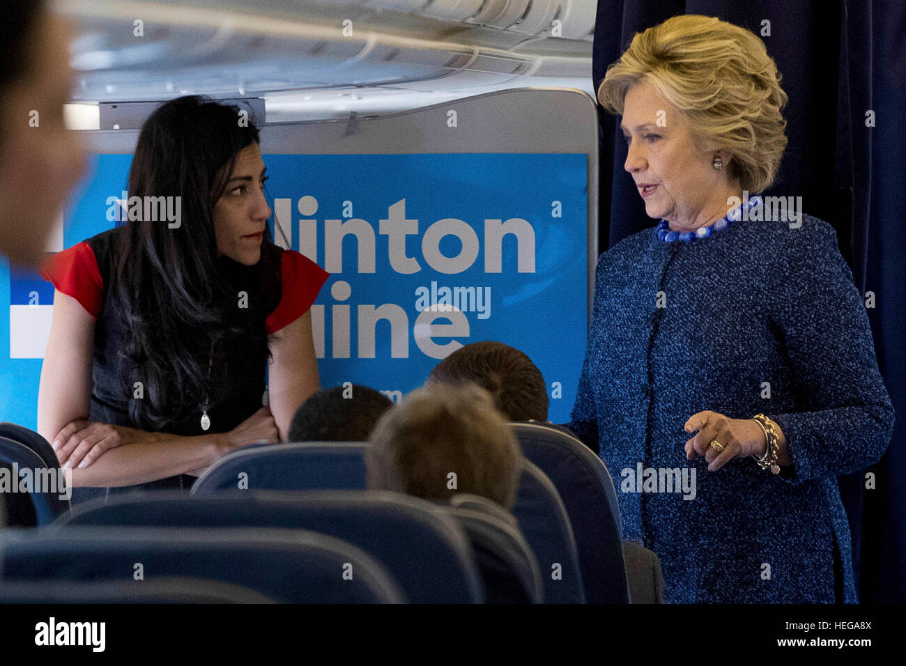 FILE - In this Oct. 28, 2016 file photo, Democratic presidential candidate Hillary Clinton speaks with senior aide Huma Abedin aboard her campaign plane at Westchester County Airport in White Plains. Amid the 2016 presidential campaign, the FBI conducted an investigation into Clinton's use of a private computer server to handle emails she sent and received as secretary of state. FBI Director James Comey criticized Clinton for carelessness but said the bureau would not recommend criminal charges. (AP Photo/Andrew Harnik, File) Stock Photo