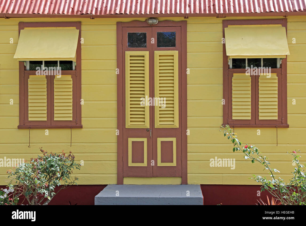 Front door and windows of traditional Chattel house Barbados Stock Front door and windows of traditional Chattel house Barbados Stock
