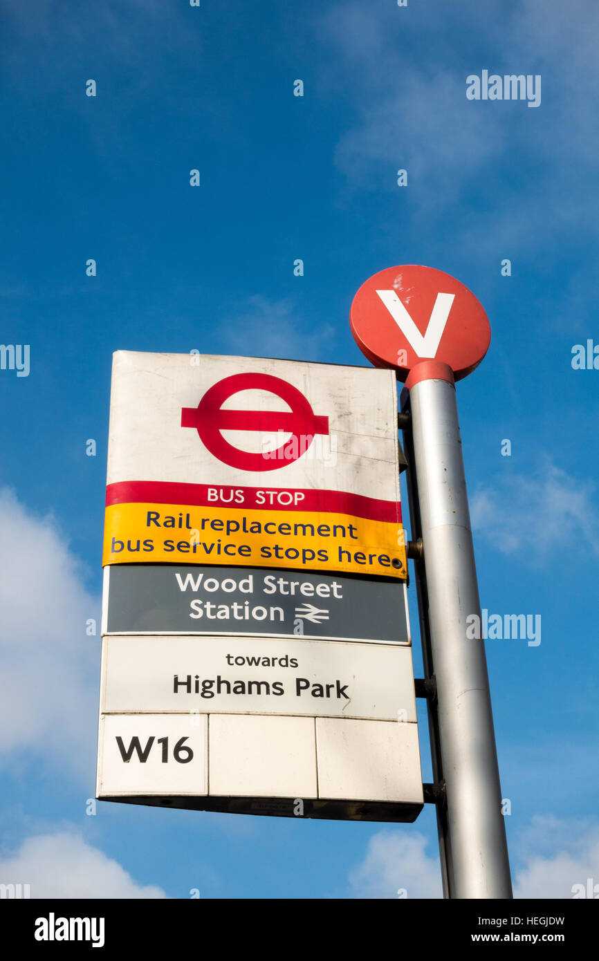 Bus Stop V at Wood Steet Station in Waltham Forest, East London, with rail replacement bus service sign. Stock Photo