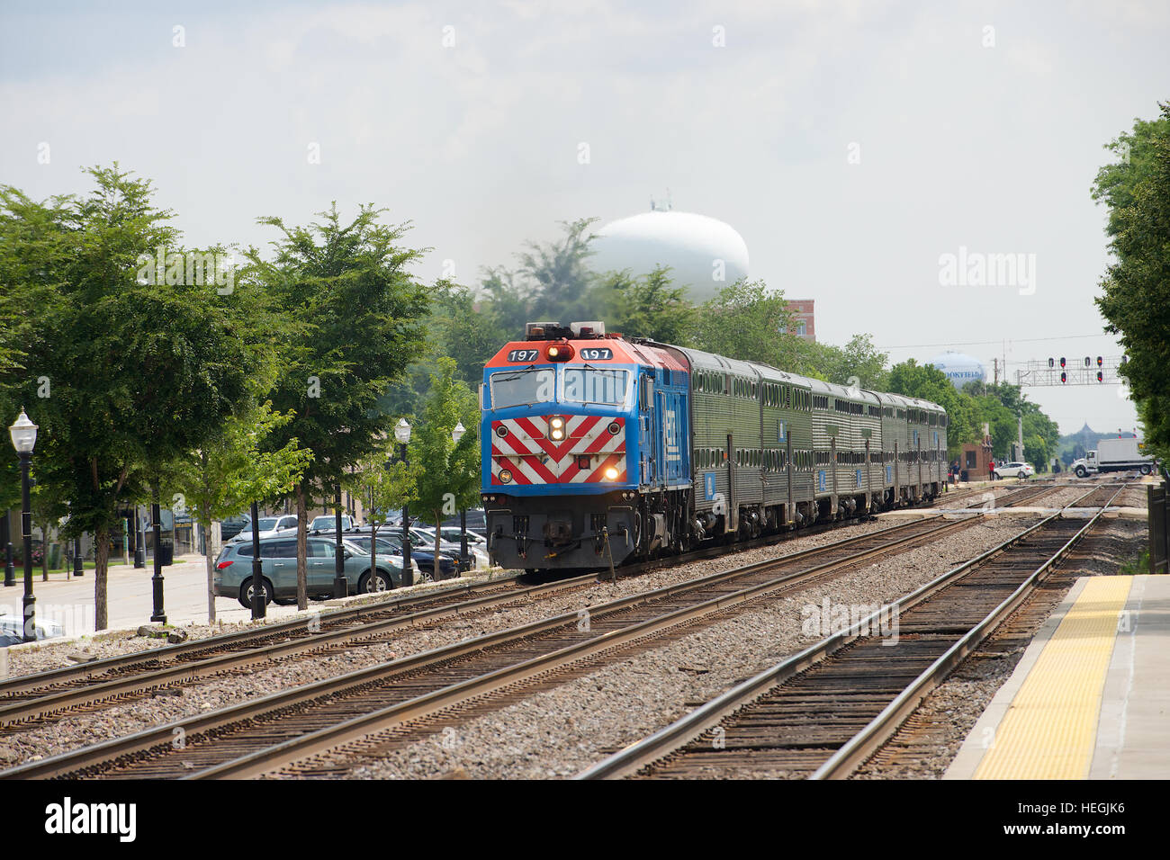 Metra commuter train approaching Stone Avenue Train Station, La Grange, Illinois, USA. Stock Photo