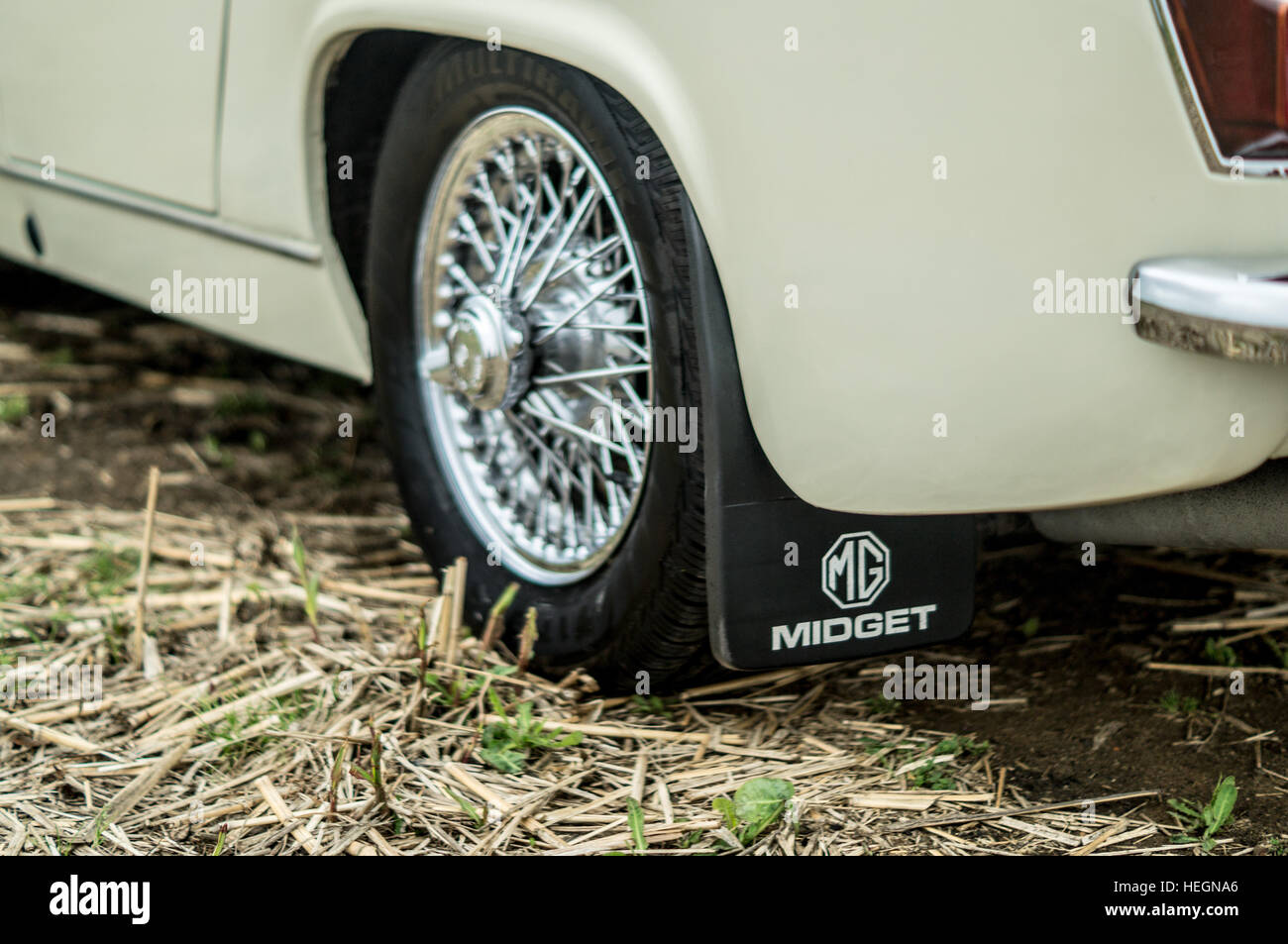MG Midget rear wheel and mud flap with name on. Stock Photo
