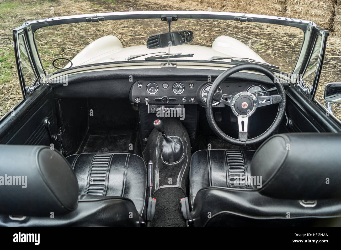 Black leather interior of an MG Midget. Stock Photo