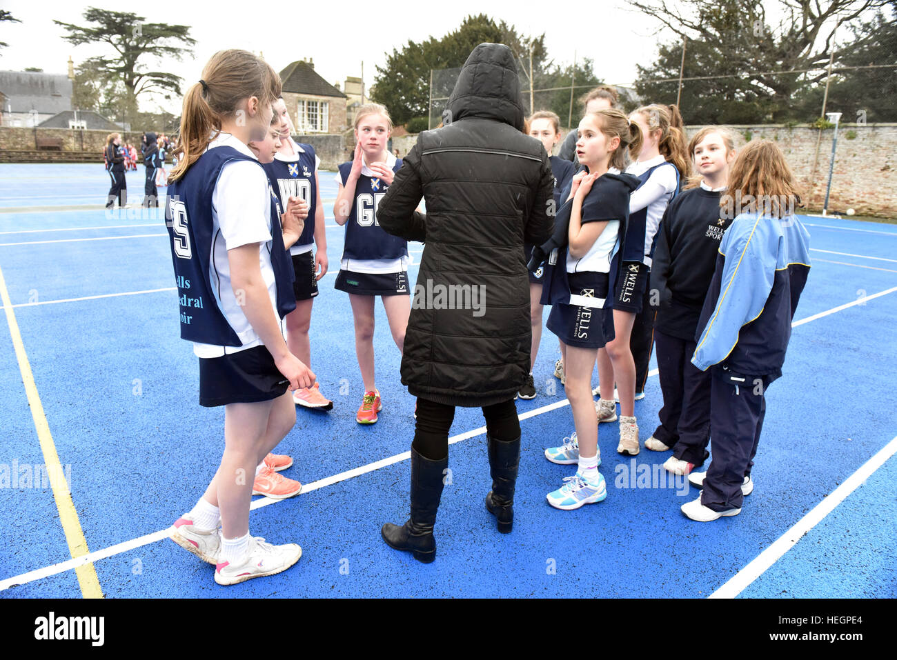 Choristers from Wells Cathedral Choir play in inter-chorister netball tournament, Wells, Somerset, UK. Stock Photo