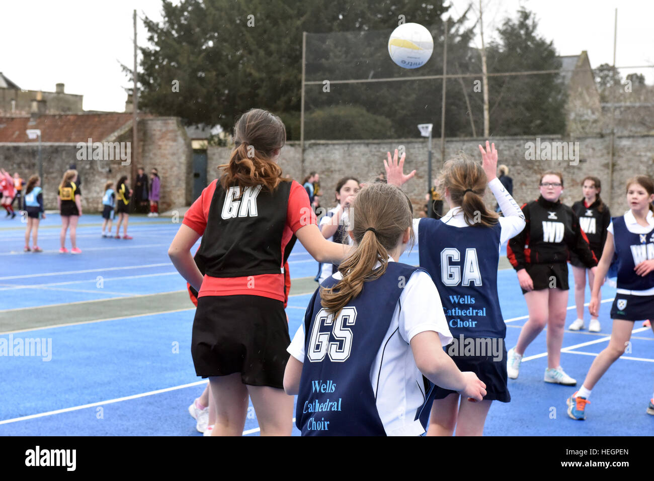 Choristers from Wells Cathedral Choir play in inter-chorister netball tournament, Wells, Somerset, UK. Stock Photo