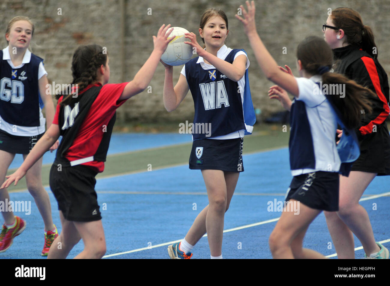 Choristers from Wells Cathedral Choir play in inter-chorister netball tournament, Wells, Somerset, UK. Stock Photo