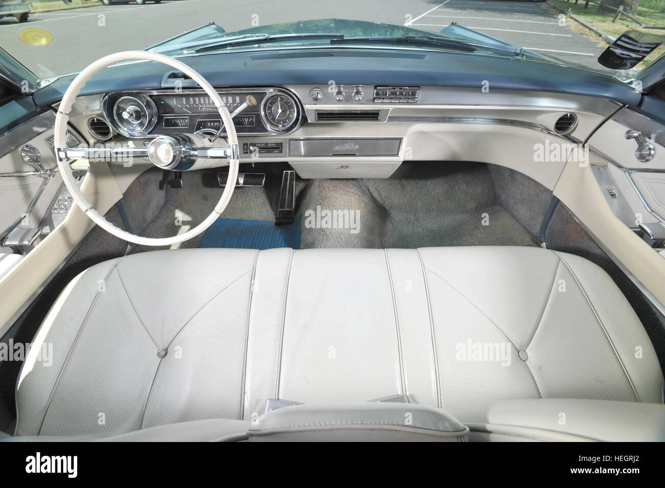 1965 Cadillac Coupe de Ville American luxury 2 door coupe front bench seat, dashboard and interior Stock Photo