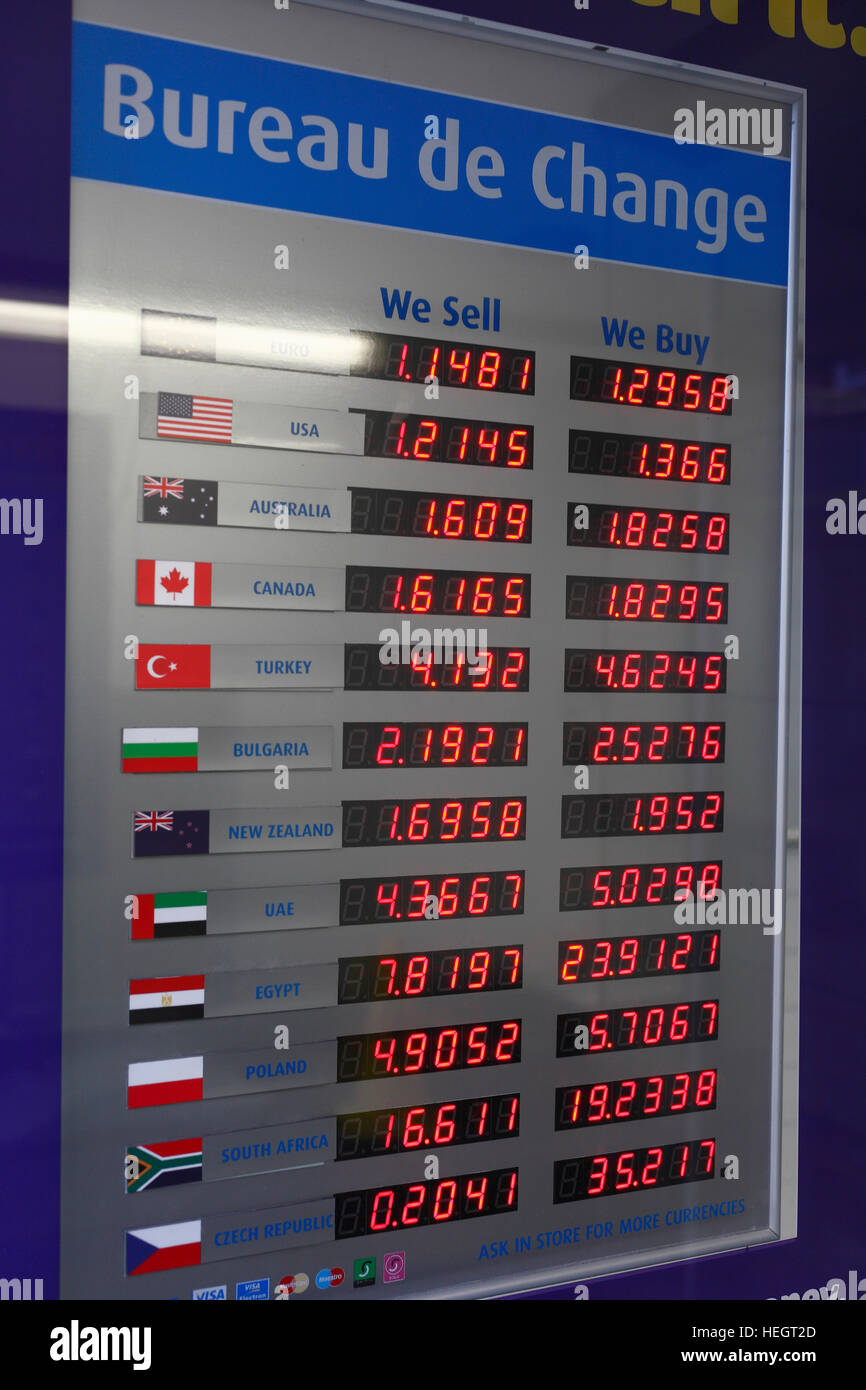 Bureau de Change display board showing rates of exchange Stock Photo - Alamy