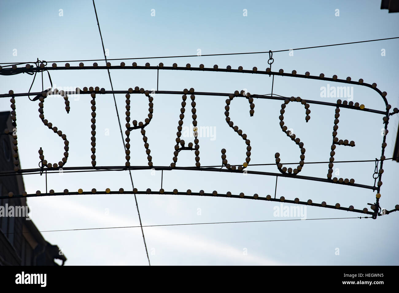 Silhouette of STRASSE street sign in Trier, German Stock Photo