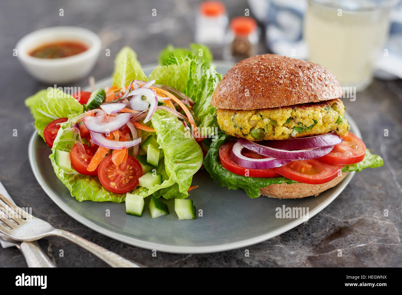 Veggie vegetarian burger bun salad Stock Photo