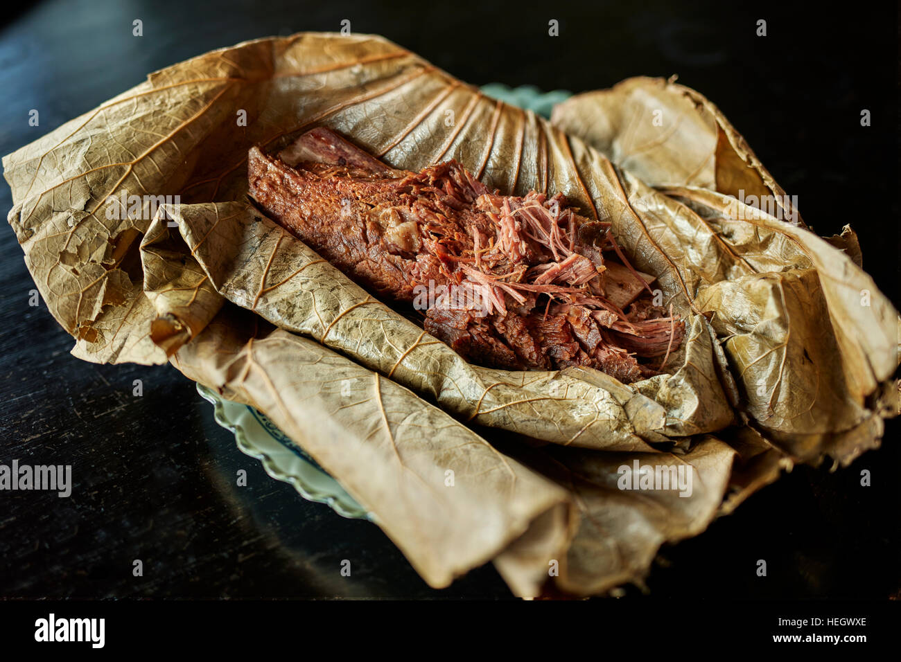 Chinese slow cooked rib of beef wrapped in lotus leaf northern chinese dish Hutong Shard restaurant Stock Photo