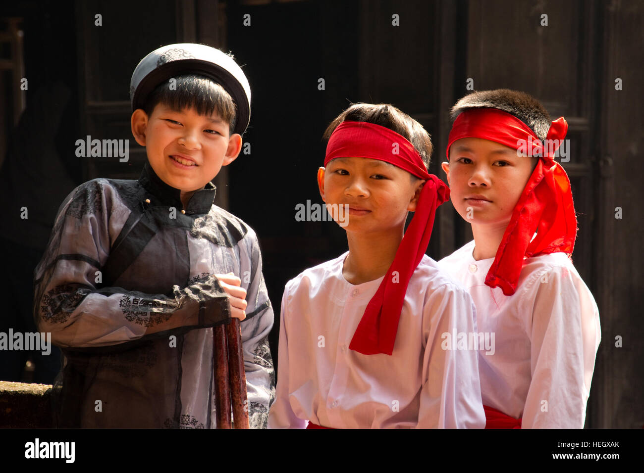 ASIA, Vietnam,  Phú Thọ (Phu Tho) Province, Hung Lo Village, Hung Lo Buddhist Temple, Hat Xoan, boys in traditional dress Stock Photo