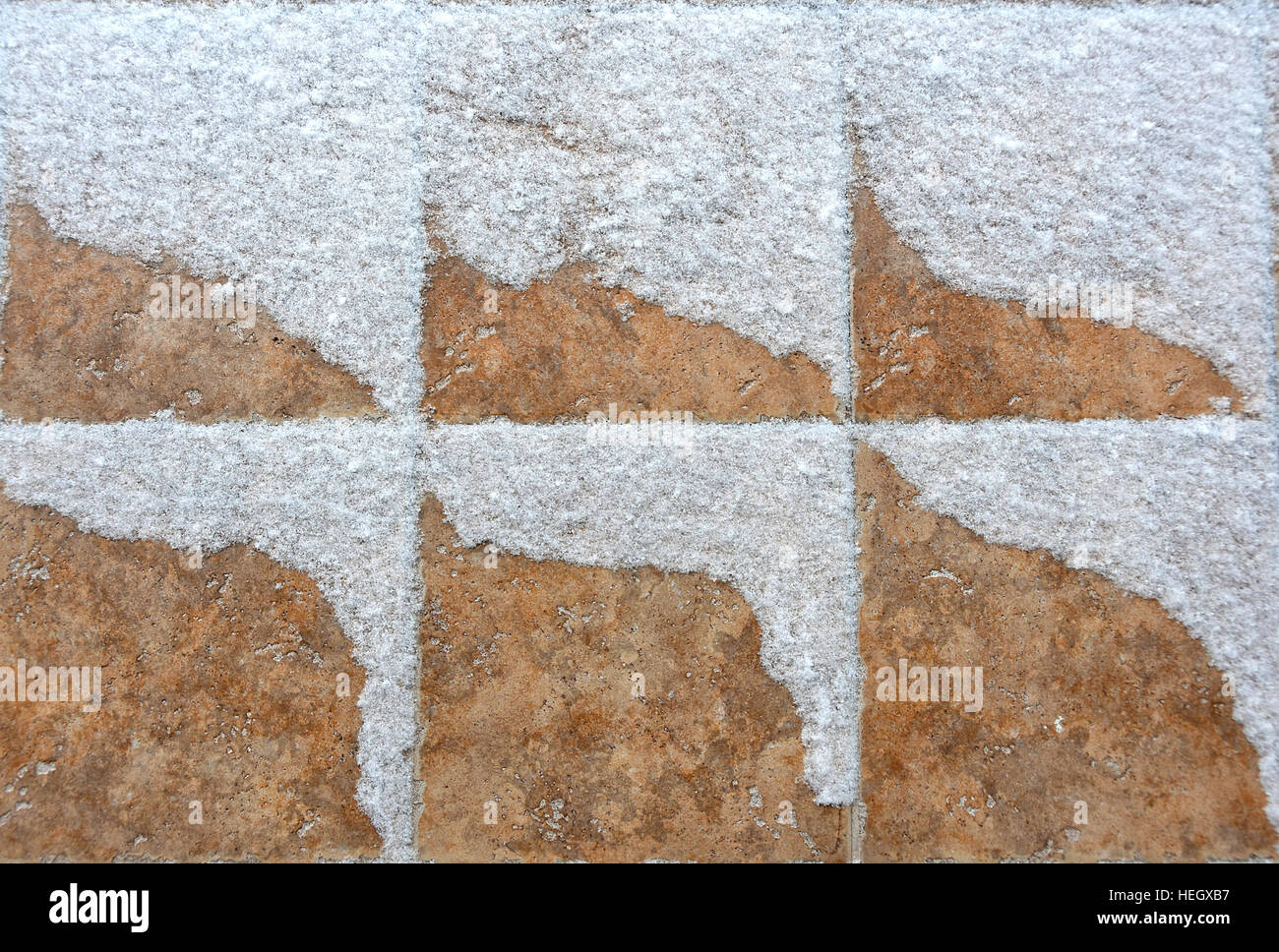snowdrift pattern on stone tile Stock Photo