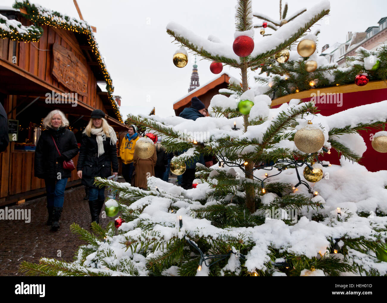 Decorated Christmas tree with snow at Christmas market in Højbro Plads, Hoejbro Square, on Strøget, Stroeget, in Copenhagen. Stock Photo
