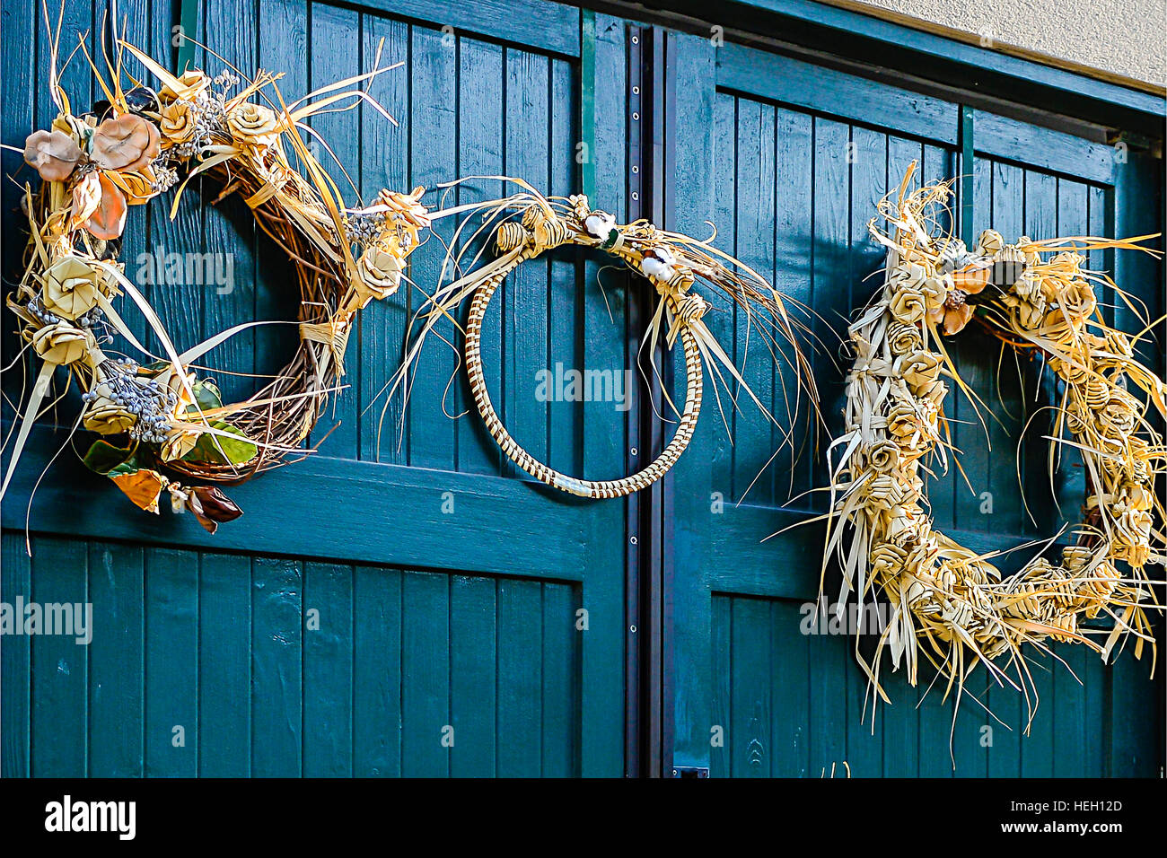 Seagrass wreaths and crafts for sell are displayed by artist outside on