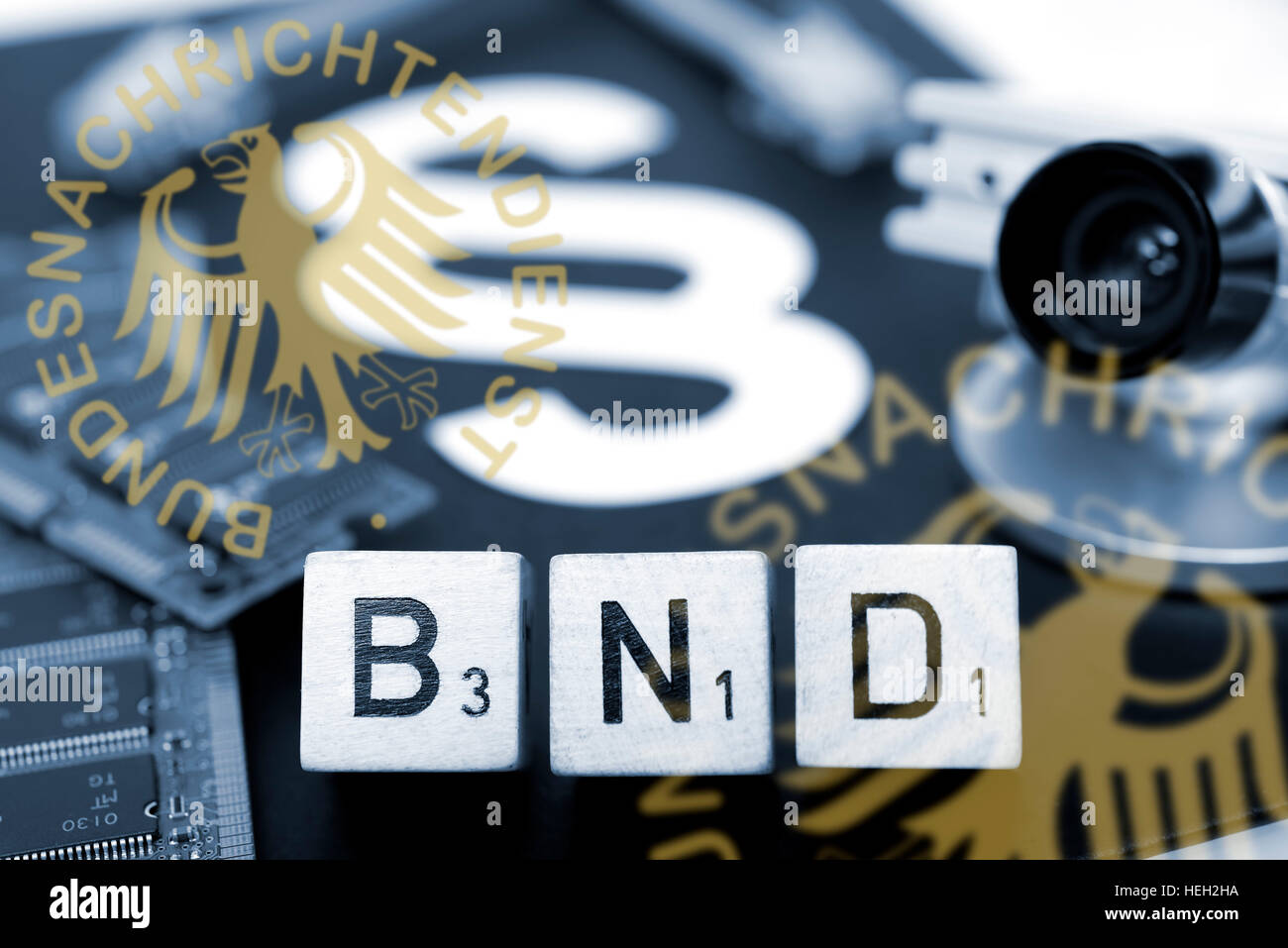 Wuerfelbuchstaben bilden den Schriftzug BND vor Gesetzbuch, Symbolfoto BND-Gesetz Stock Photo