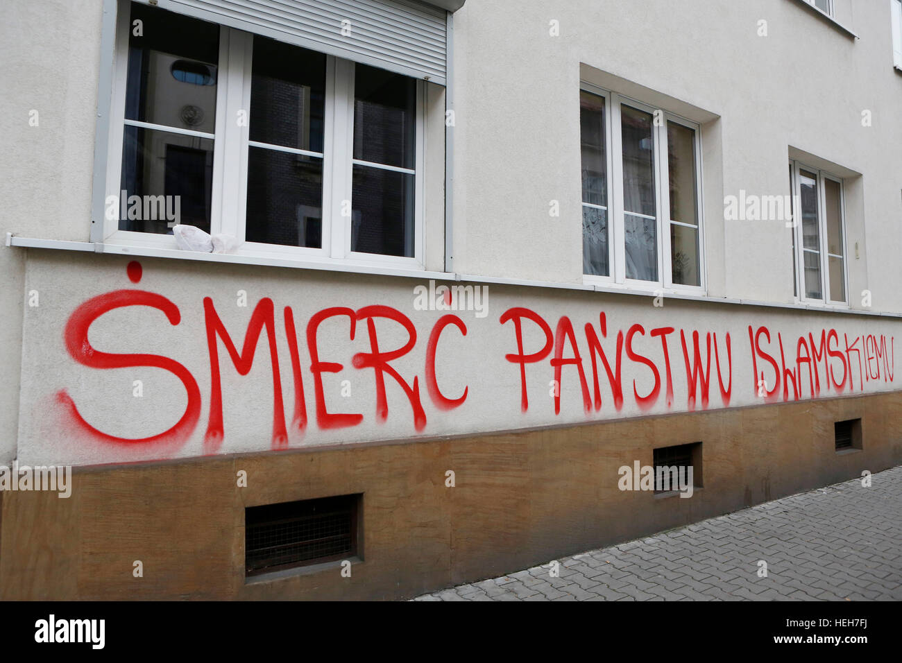 KRAKOW, POLAND, NOVEMBER 26, 2015, Graffiti anti Islam and ISIS at Krakow Stock Photo