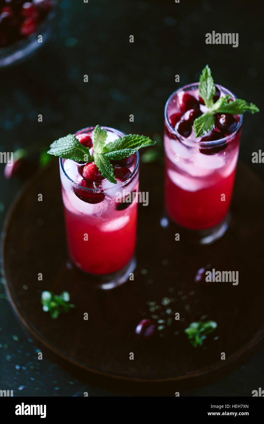 Cranberry and Mint Rum Punch in tall glasses Stock Photo