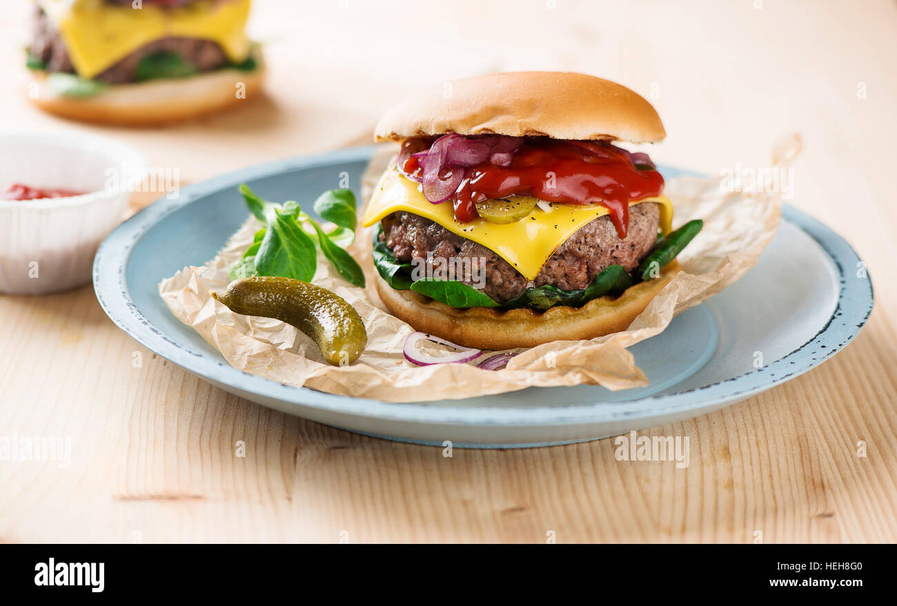 Beef burger with melted cheese Stock Photo