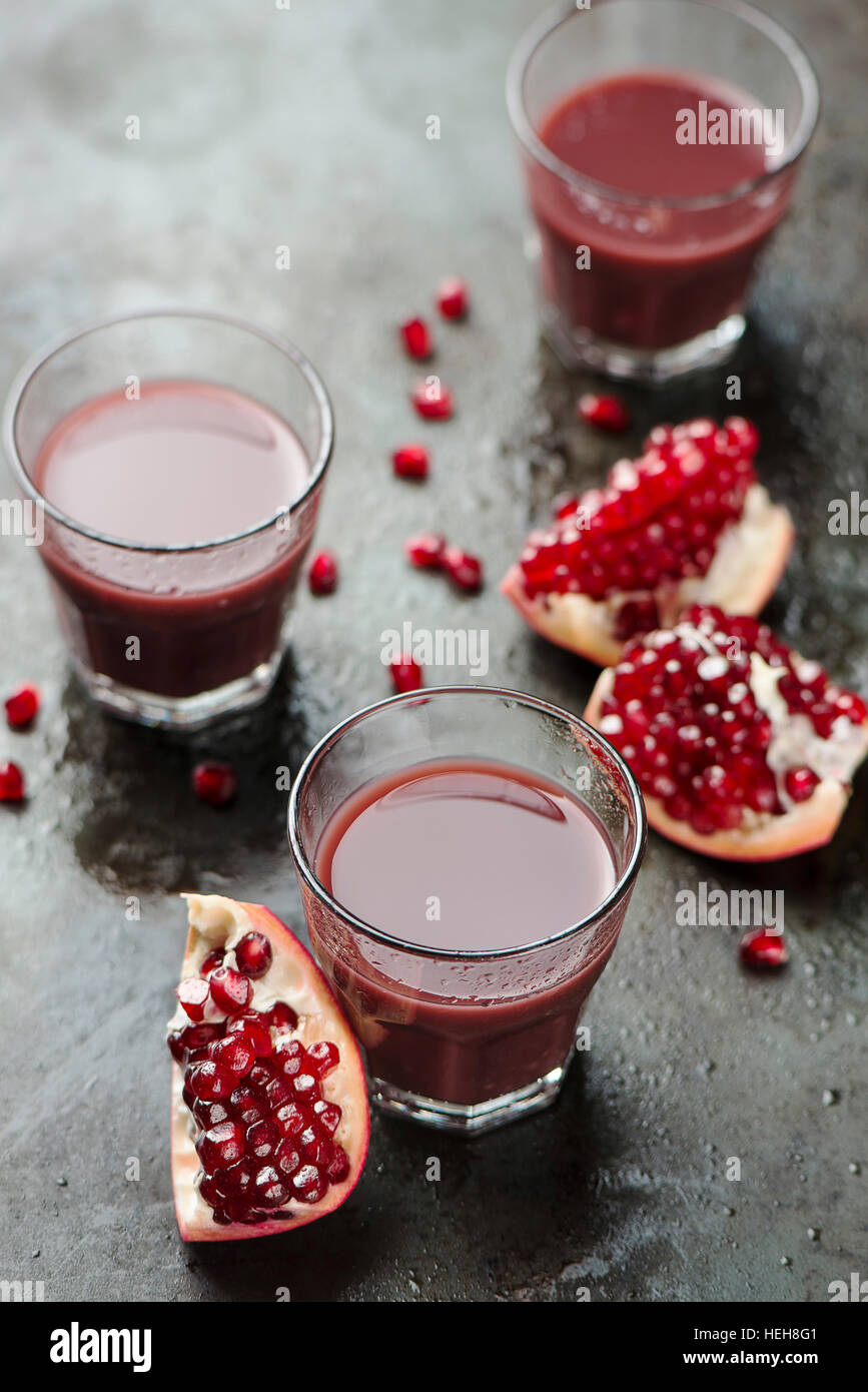 Ripe pomegranates with juice Stock Photo