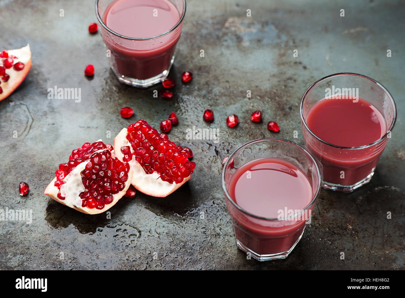 Ripe pomegranates with juice Stock Photo