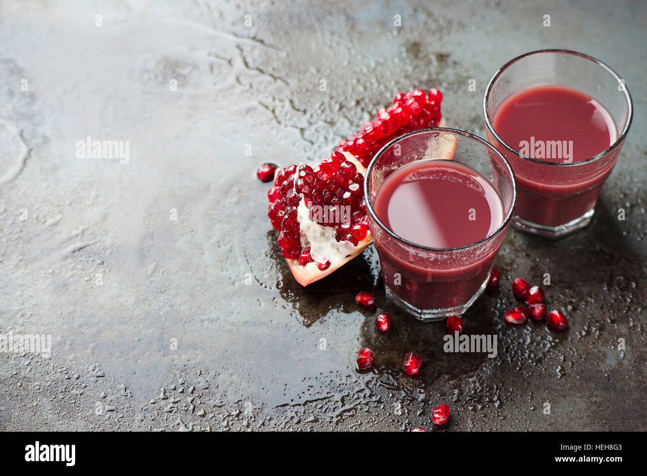 Ripe pomegranates with juice Stock Photo