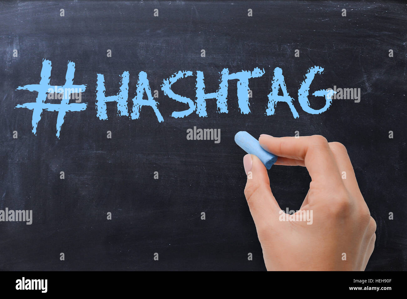 Social media hashtag on blackboard with chalk Stock Photo