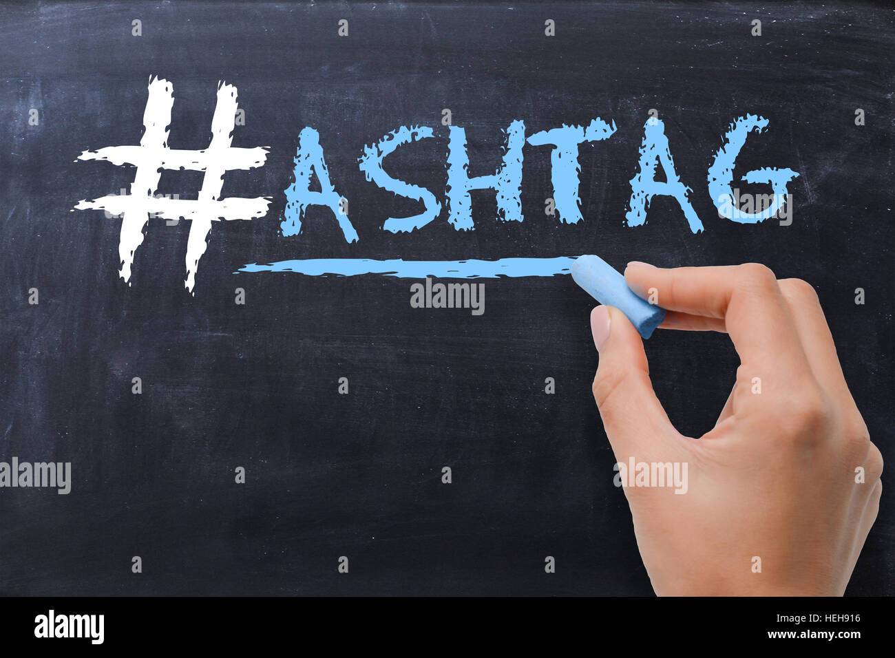 Social media hashtag on blackboard with chalk Stock Photo