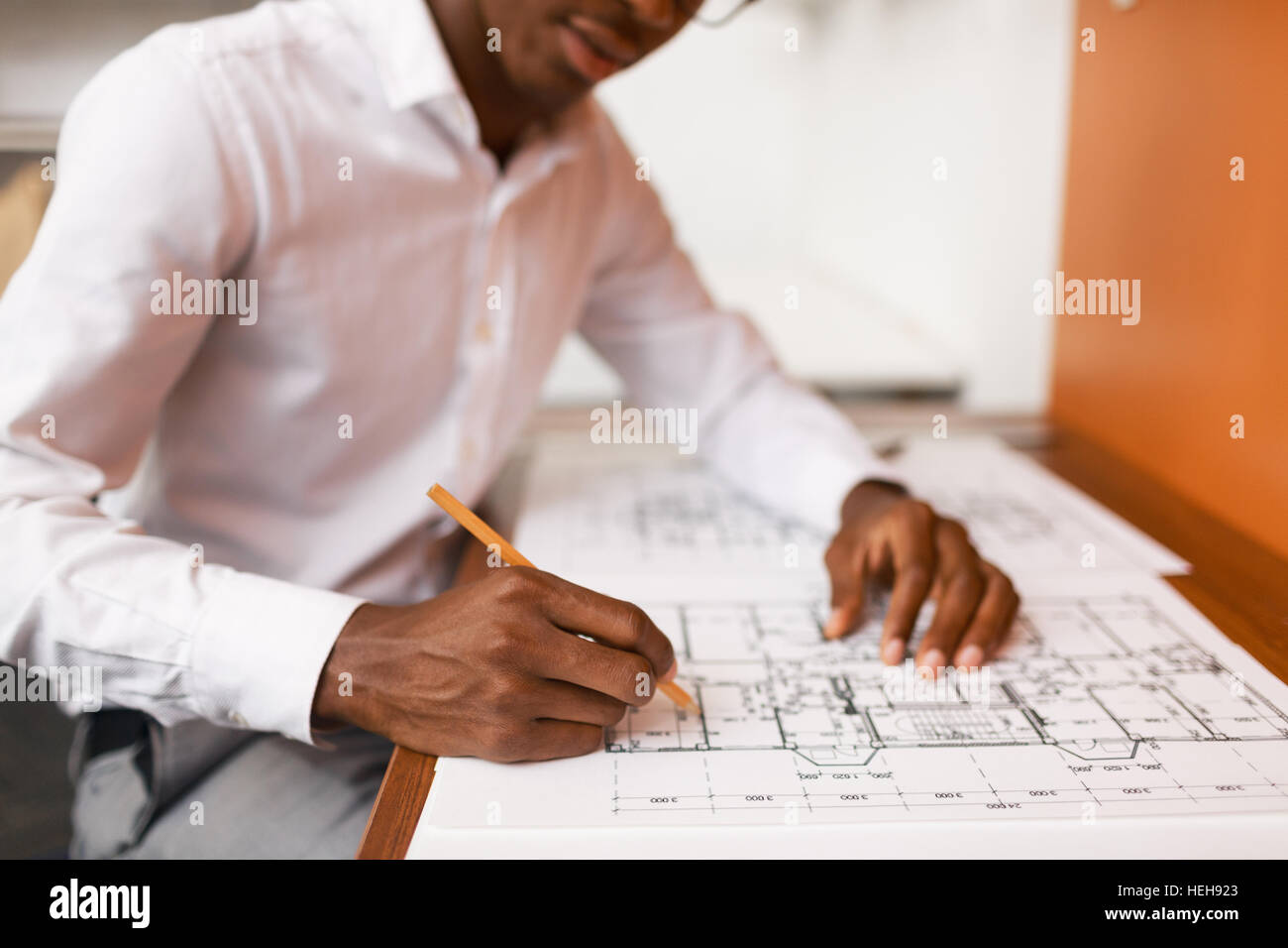 Modern designer drafting scheme of new building project Stock Photo Alamy